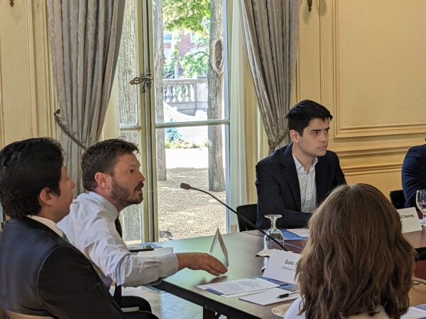 Sean Silbert from the Embassy of the Kingdom of the Netherlands asks a question to Ms. Elham Tabassi during a Tech Envoy Series program at Meridian House in Washington, DC on July 14, 2023. Photo by Jessica Hill.