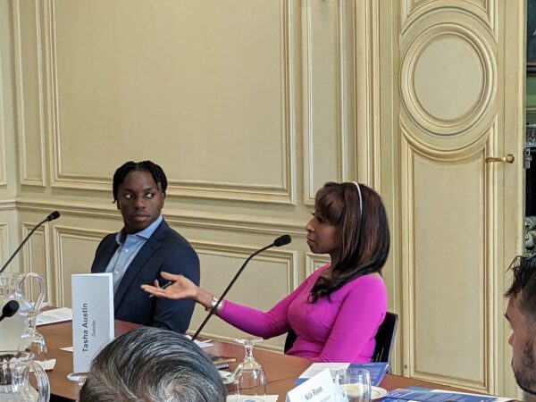 Tasha Austin from Deloitte asks a question to Ms. Elham Tabassi during a Tech Envoy Series program at Meridian House in Washington, DC on July 14, 2023. Photo by Jessica Hill.